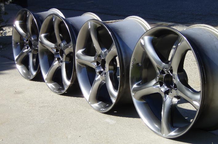 Photo of four wheels repaired and repainted by Wheel Magic, Inc., Northern California's leader in onsite alloy wheel and rim repair
